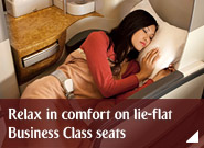 Relax in comfort on lie-flat Business Class seats