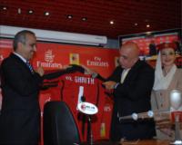 Gait Al Ghaith, Executive VP Commercial Operations World Wide, Emirates receives a gift of a signed shirt 