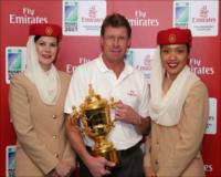 1991 winning Captain Nick Farr-Jones with the Webb Ellis Cup and Emirates Crew