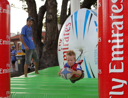 Young fan trying out the Emirates tryline tussle